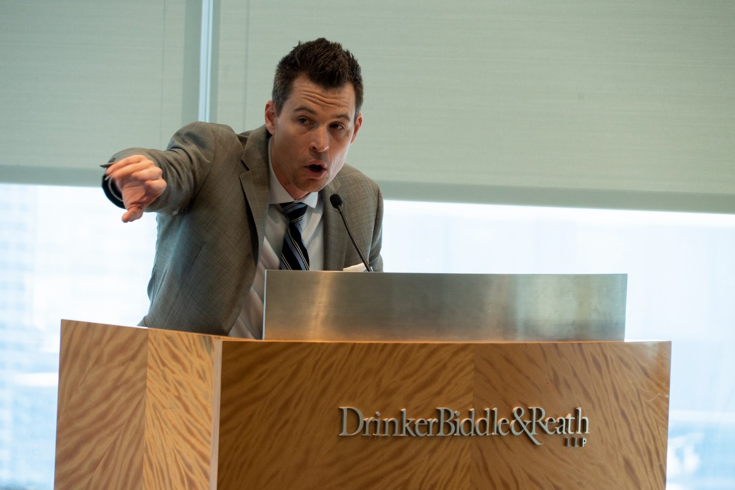 Joseph Gaspero speaking at a podium